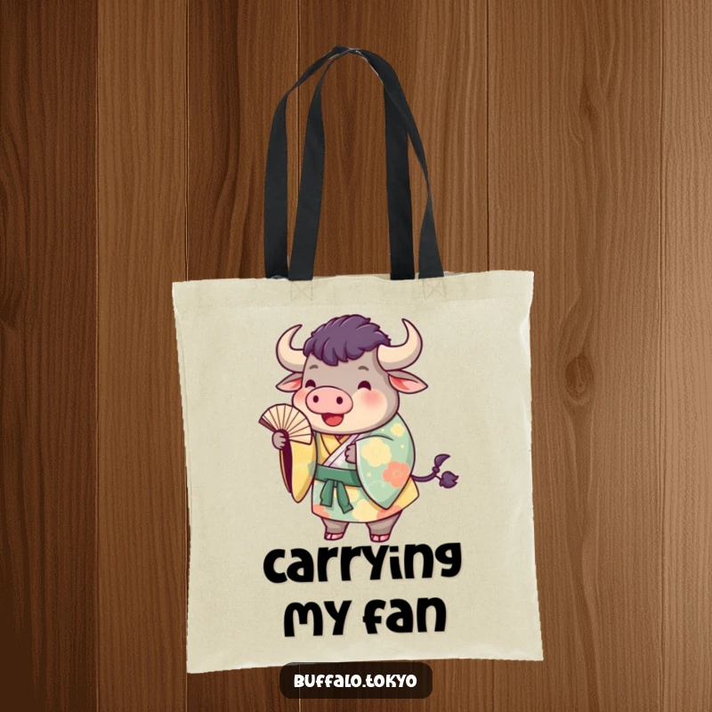 Funny buffalo kimono tote bag featuring a plump buffalo in a colorful kimono playfully tossing a fan. Chic and fun.